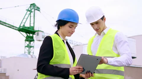 Construction site on the top in front of the camera charismatic young Stock-Footage 138203136