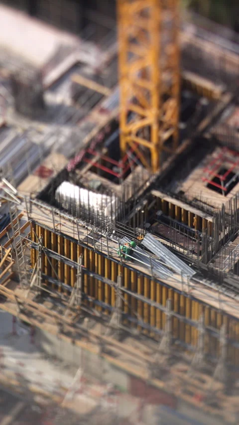 Construction site with tower crane in Dubai, vertical tilt shift timelapse Stock Footage 340475245