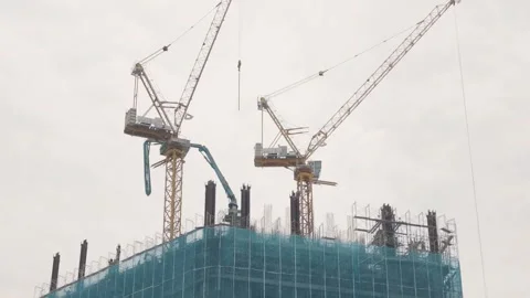 Construction Site with Tower Cranes and Building Under Development Vídeo Stock 346469896