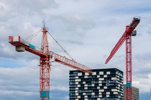 Construction site with tower cranes and building 스톡 사진