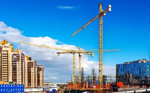 Construction site. Tower cranes. Stock Photos