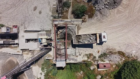 Construction site with truck unloading materials in the daytime Stock Footage 339056391