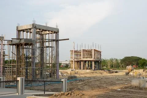 A construction site with two buildings under construction Stock Photos