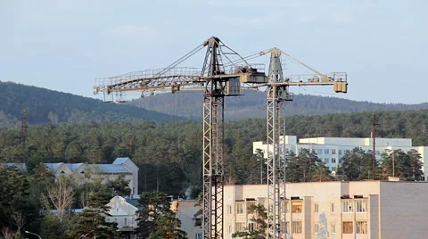 Construction site with two working tower cranes 库存影片 921369