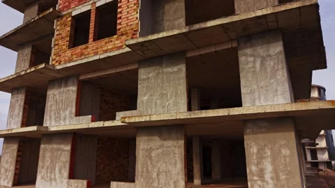 Construction site of an unfinished building in a developing area Stock Footage 324521421