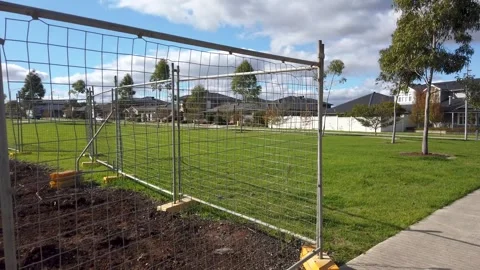 Construction site with vacant plot to be developed in a suburb Stock Footage 275159081