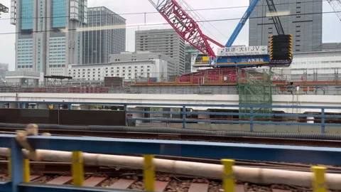 Construction Site View from moving train in Tokyo , Japan Stock Footage 255628668