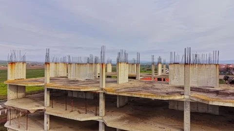 Construction site view of a partially built structure in an open landscape Stock Footage 324520339
