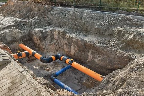 Construction site water utility pipes Stock Photos