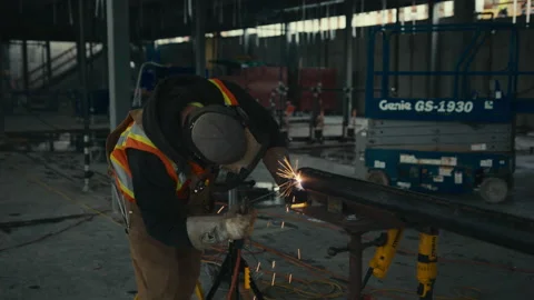 Construction Site: Welder works on pipe Stock Footage 224957160