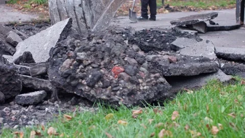 Construction site where excavation, breaking, and removal of asphalt and Stock Footage 312437116