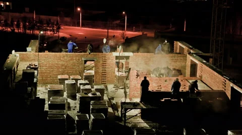 At the construction site. Winter. Evening Stock Footage 64915942