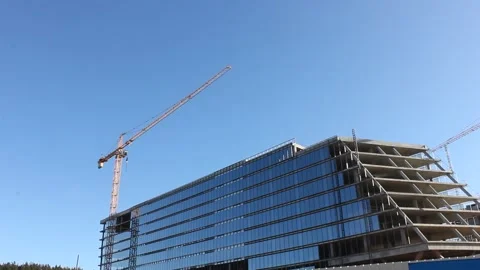 Construction site without workers on a clear sunny day Видео 124358060