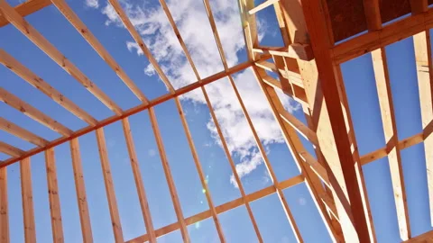 Construction site wooden frame under installing joists roofing frame stick Stock Footage 337739784