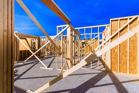 Construction site wooden frames supports under house framework Foto stock