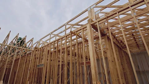 Construction site wooden framing in developing residential area Video stock 320189422
