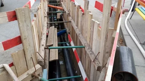 Construction site with wooden planks and pipes Video stock 138981853