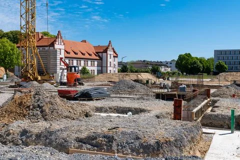 Construction site with work on the construction of the foundation. Stock Photos