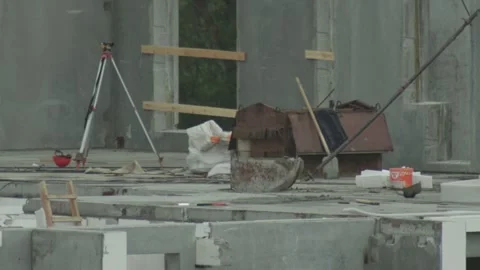 Construction site work progress with building materials and equipment for Stock Footage 339865858