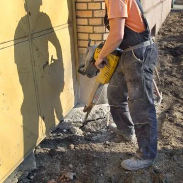 Construction site, worker and jackhammer tool Stock-Fotos