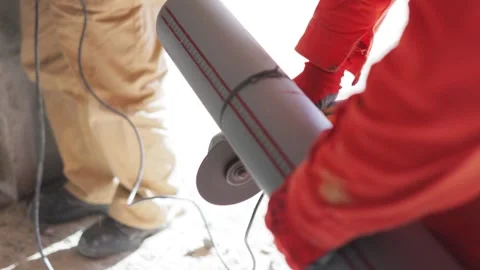 Construction Site: Worker Cutting Plastic Pipe with Circular Saw Stock Footage 271583051