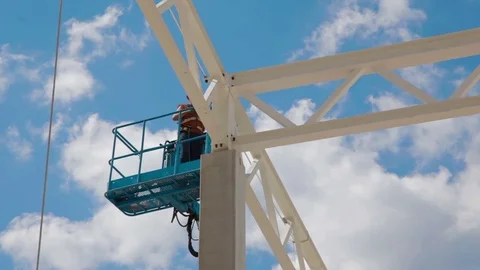 Construction site worker. Modern Warehouse building Stock Footage 83636460