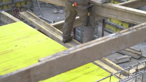 Construction site, workers, and building materials.  Stock Footage 155032744
