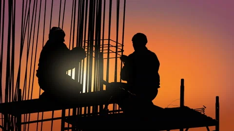 Construction site workers build skyscraper at sunset Stock Footage