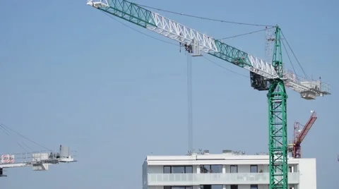 Construction site workers   building new apartments. silhouette crane working Video stock 57371236