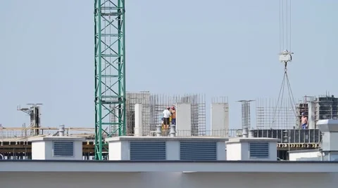 Construction site workers   building new apartments. silhouette crane working Video stock 57371539