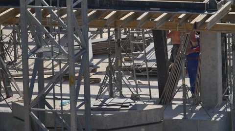 Construction site workers   building new apartments. silhouette crane working Video stock 57372402