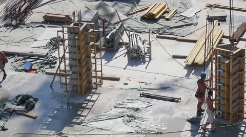 Construction site workers   building new apartments. silhouette crane working Video stock 57372976