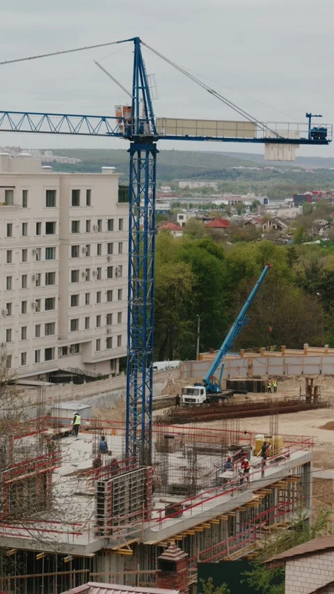Construction site workers building new development timelapse Stock Footage 345519527