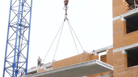 Construction site with workers of high-rise houses of brick tower cranes. Con Stock-Footage 78909545