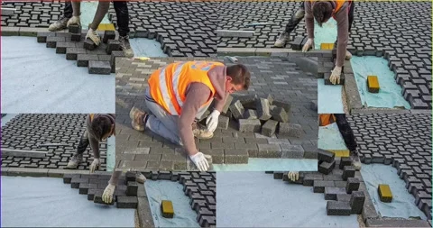 Construction site with workers laying interlocking concrete pavers. Close-up  Video stock 303344873