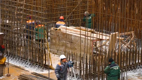 Construction site. Workers prepare reinforcement for the construction of Stock Footage 259375585
