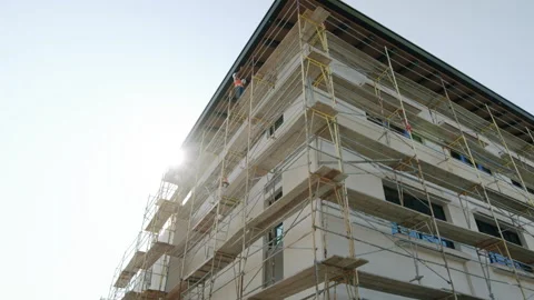Construction Site Workers On Scaffolding Side Of Building 4K 48FPS SLO-MO Stock Footage 266313650