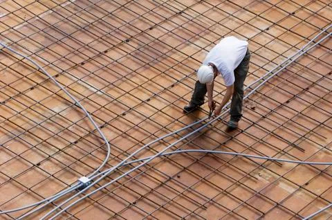 Construction site with workers on site platforms, Vancouver, British Columbia, 写真素材