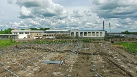 Construction site with workers working on.  Stock Footage 211822360