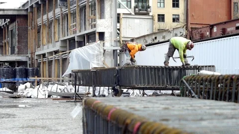 Construction Site Workers Working on Steel 動画素材 82371496