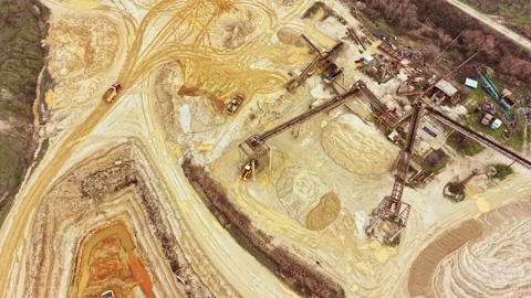 Construction site working on a mining project with heavy machinery and dirt, Stock Footage 331901451