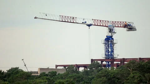 Construction site with working tower crane Видео 921351