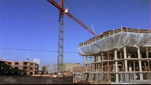 Construction Sites 2 Cranes swing timelapse near apartments Stock Footage 145617656