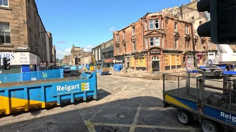 Construction Skip Moving Through Urban Street in Perth, Scotland Stock Footage 316279021