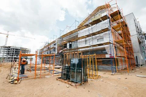 Construction of a social facility of a school or kindergarten in a modern sty Stock Photos