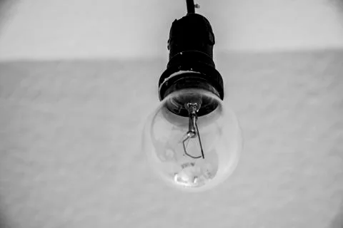 Construction socket bulb in the socket in black white Stock Photos
