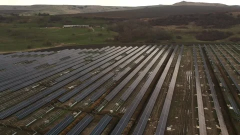 Construction of solar panels. Ecology solar power station panels in the fields Stock Footage 154453416