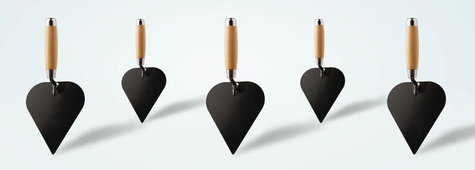 Construction spatulas panoramic image Stock Photos