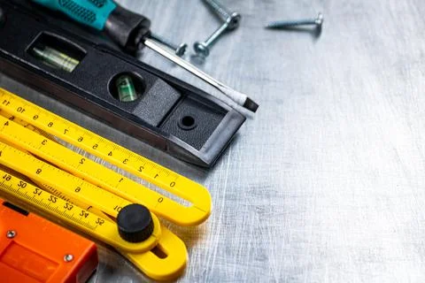 Construction stapler on the table. Stock Photos