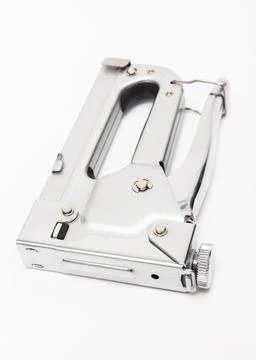 Construction stapler on white background Foto stock